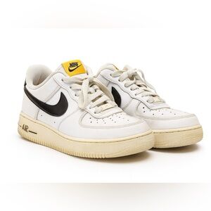 Nike Women’s White and Black Sneakers